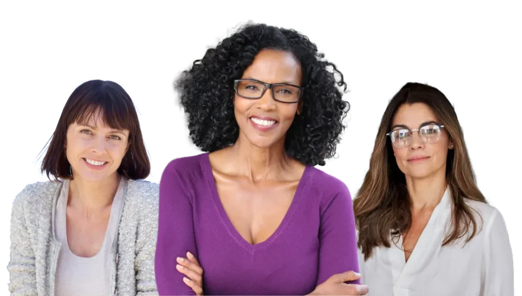 Three women smile at the camera.